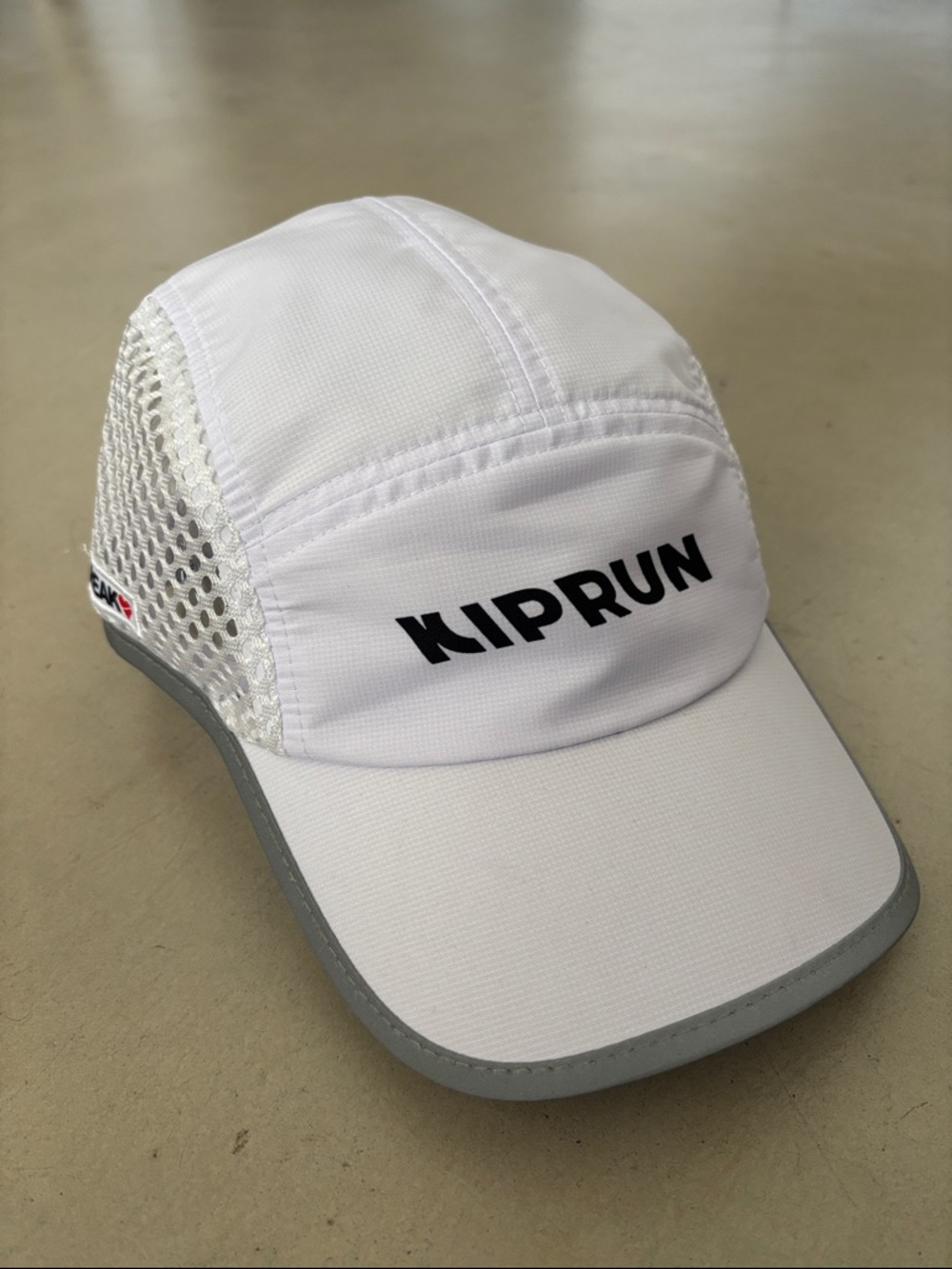 CCO sale! NWOT Kiprun x Heartbreak reflective Running Hat